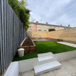 francesco landscaping and building client image of a stunning garden in north london with a new lawn and priacy fencing